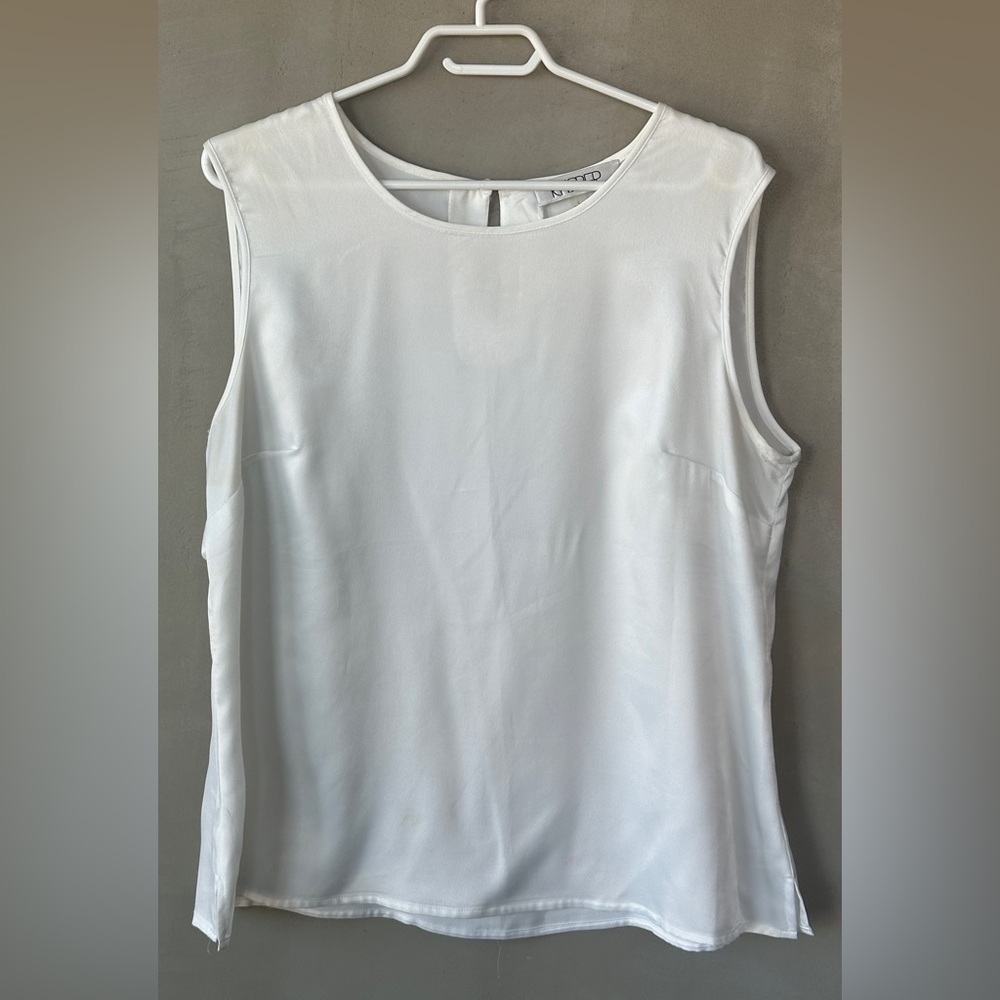 White Sleeveless Blouse